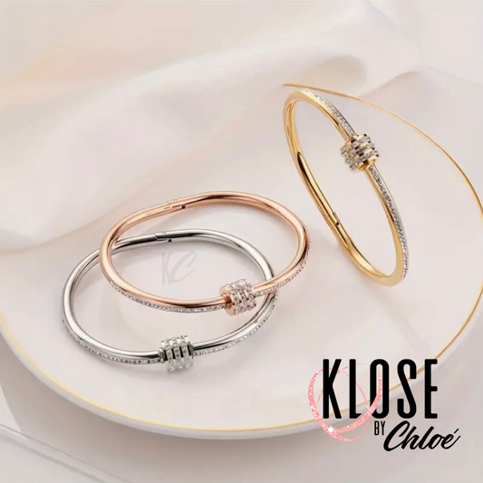 CHLOÉ  Spiral Twist Clasp Bangle